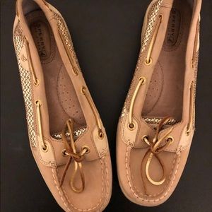 Tan and gold sperry shoes